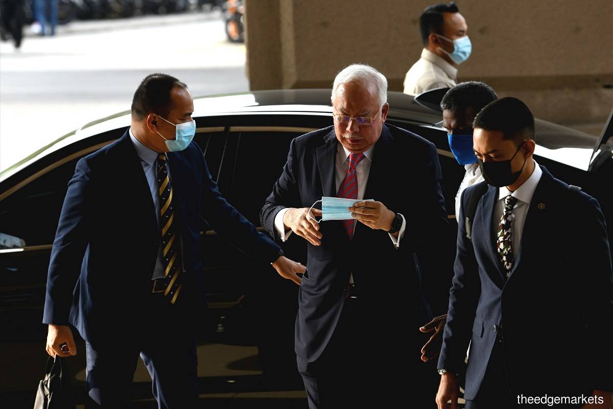 Najib faces four counts of abuse of power and 21 counts of money laundering in relation to 1MDB funds to the amount of more than RM2.28 billion. (Photo by Shahrin Yahya)